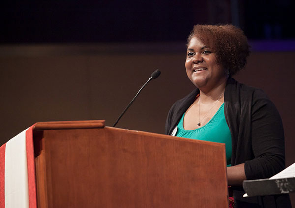 Marci Matthews, daughter of Bishop and Mrs. Matthews, speaks during the celebration.