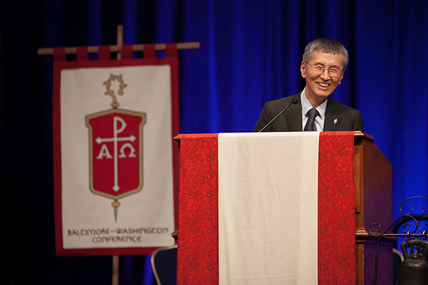 Bishop Young Jin Cho, Virginia Area, speaks during a morning Bible study.